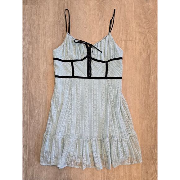 Urban Outfitters Blue Lace Mini Dress M Black Trim Ruffle Hem - Picture 1 of 4